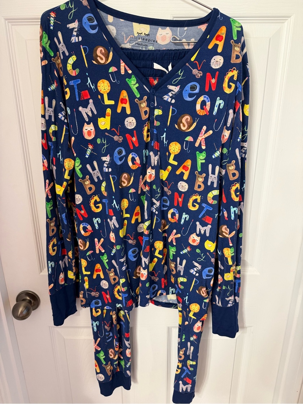 Little Sleepies featuring a playful, colorful alphabet with animals print size M